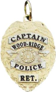 two tone 14k yellow gold custom mini-badge jewelry pendant; eagle badge design of Wood-Ridge Police Department; rhodium plated ribbons with black letters