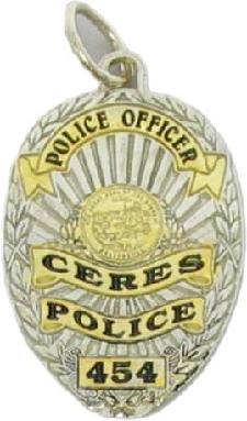 Two tone sterling silver custom mini-badge jewelry pendant; shield shaped badge design of the Ceres, CA Police Officer; also available as mini-badge tie tac, lapel pin, cuff links