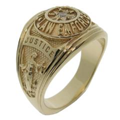 Our Texas Law Enforcement class-style ring shown in 14k yellow gold with center set gemstone.