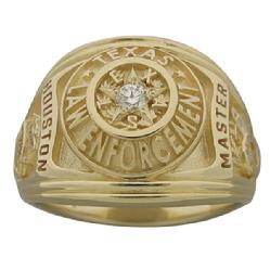 A custom Houston Police Sergeant's professional ring in 14k yellow gold with a 0.08 ct. round brilliant diamond.